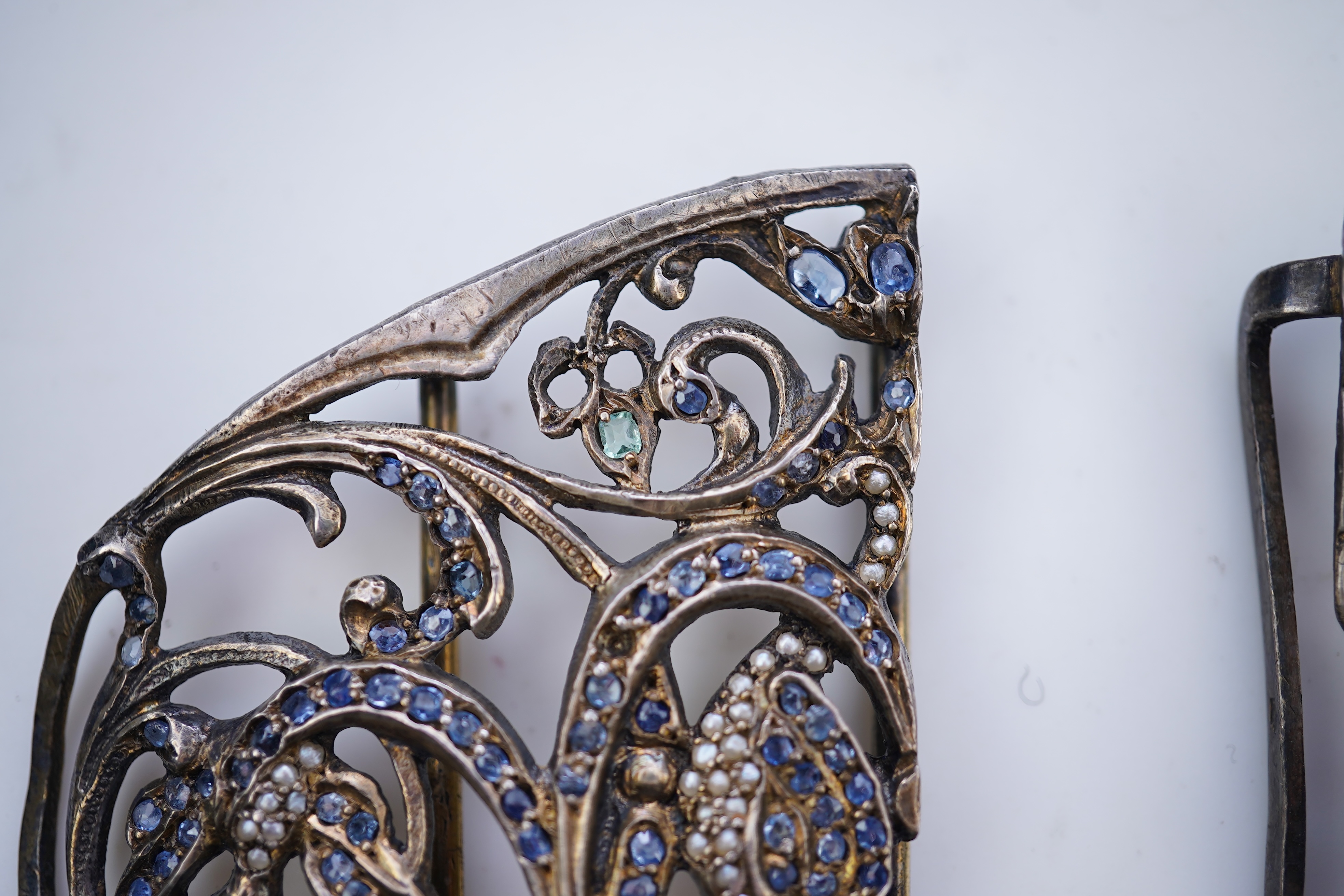 An Art Nouveau gem-set and seed pearl belt buckle, circa 1900